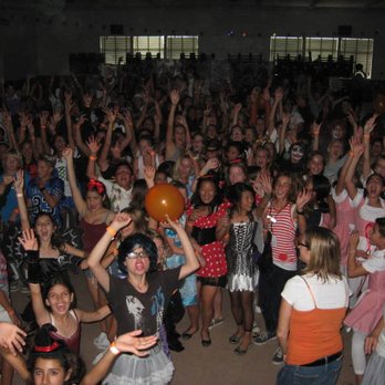 Party Time DJ Services - a large group of people dancing - DJs Near Me
