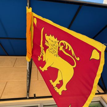 Banana Leaf - Sri Lankan flag - the Lion Flag or Sinha Flag, symbolizes unity, cultural heritage, and bravery. - Sri Lankan Near Me - Manassas, Virginia Banana Leaf - Sri Lankan flag - the Lion Flag or Sinha Flag, symbolizes unity, cultural heritage, and bravery. - Sri Lankan Near Me - Manassas, Virginia