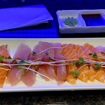 Show Sushi - Left to Right: Pepper Salmon, Albacore, Regular Salmon, Yellowtail Carpaccio - Sushi Bars Near Me - San Dimas, California