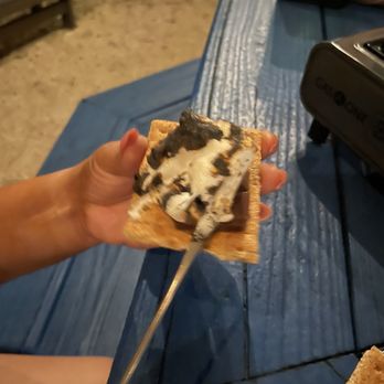 Salty Sisters Bar And Grill - Finished s'more - Bars Near Me - Cocoa Beach, Florida Salty Sisters Bar And Grill - Finished s'more - Bars Near Me - Cocoa Beach, Florida