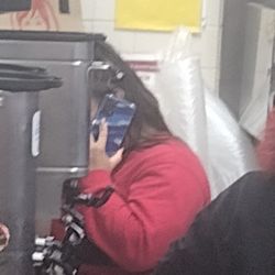 Wendy's - On phone the whole shift dancing with her siblings in front of customer