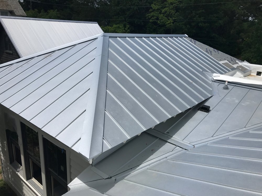 Slide of Canaan roofing and gutters