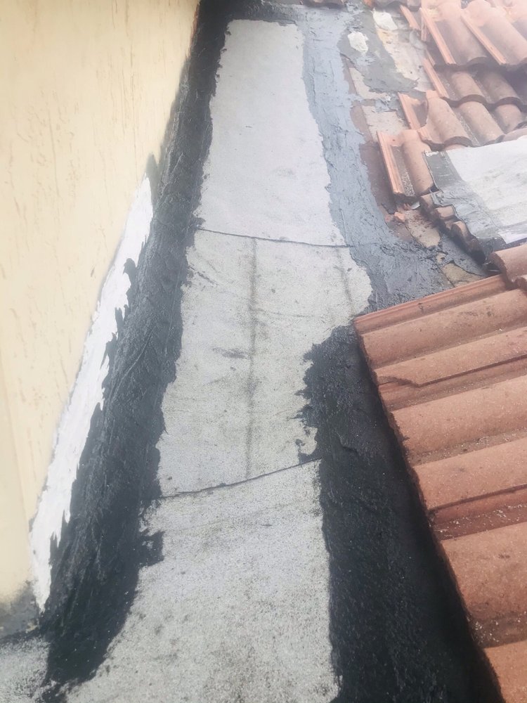 Slide of Red River Roofing