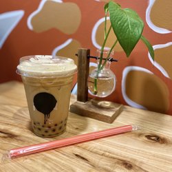 Tap Culture Coffee - Nitro latte with peppermint and chocolate boba. Oat milk is a only .50¢ up charge.