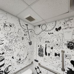 Swine City Brewing - Bathroom art, handicap rails.