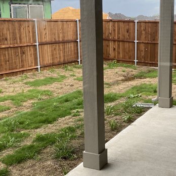 Pacesetter Homes - A distant shot of the puddle and my back door.  2 months into owning the home - Real Estate Services Near Me - McKinney, Texas