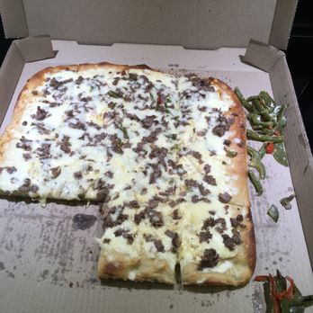Pancetta Pizza Bar - The pizza that we picked up with only some of the peppers removed. - Italian Near Me - Cocoa Beach, Florida
