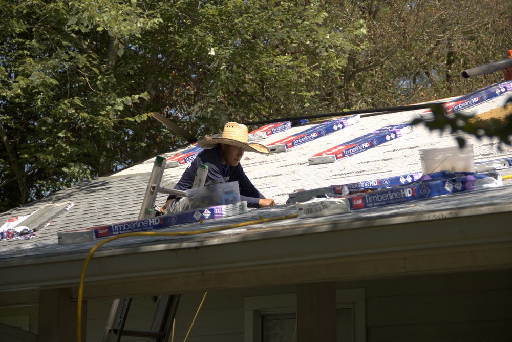 Slide of Rosie's Roofing and Restoration
