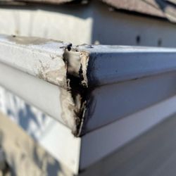 Simplex Gutter Systems - Before: this costumer was missing corner miters which causes the corner seams to open up.