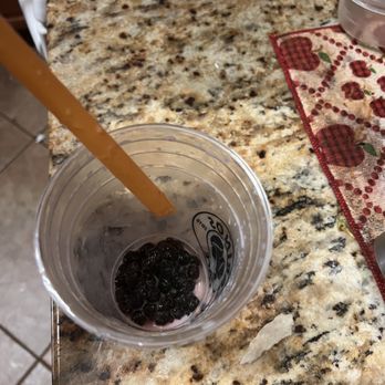 Cariño's Cafe - Strawberry Boba in clumps. I had to throw out the drink to see what was going on because the boba wouldn't come up the straw. - Cafes Near Me - Kissimmee, Florida