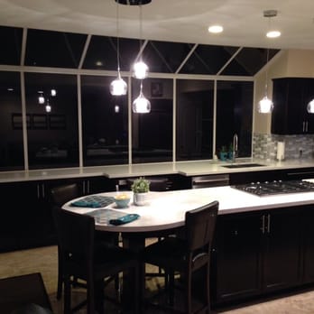 Frontier Cabinets - Espresso cabinets, white quartz counter tops with stainless steel accents. - Cabinetry Near Me - Norwalk, California