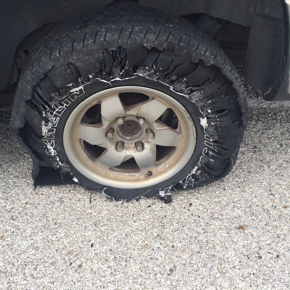 This was our tire before they helped us back onto the road! I would definitely use this business again if I needed to!