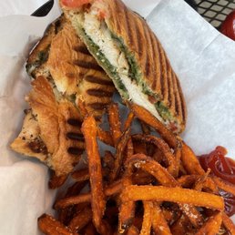 grilled chicken pesto panini and sweet potato fries grilled chicken pesto panini and sweet potato fries