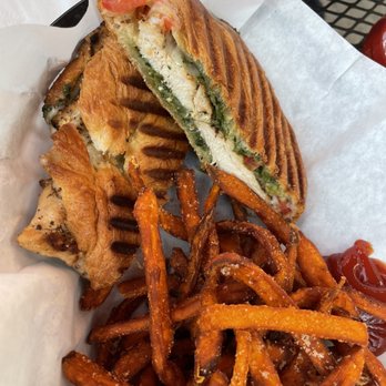 Copper Fire Bar & Eatery - grilled chicken pesto panini and sweet potato fries - Bars Near Me - Belleville, Illinois Copper Fire Bar & Eatery - grilled chicken pesto panini and sweet potato fries - Bars Near Me - Belleville, Illinois