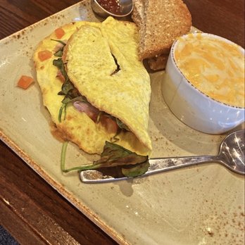 First Watch - Ham and Gouda omelet+ spinach and tomatoes with cheesy grits - Breakfast & Brunch Near Me - Oxford, Mississippi First Watch - Ham and Gouda omelet+ spinach and tomatoes with cheesy grits - Breakfast & Brunch Near Me - Oxford, Mississippi