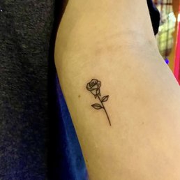 Rose tattoo by Eli