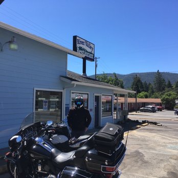 River Valley Restaurant - a man standing next to a motorcycle - Breakfast & Brunch Near Me - Cave Junction, Oregon