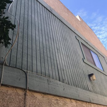 Skyrise Stucco - Showing old siding to be replaced with stucco. - Stucco Services Near Me Skyrise Stucco - Showing old siding to be replaced with stucco. - Stucco Services Near Me