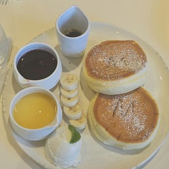 Westman Cafe - souffle pancakes with cheese cream,syrup,mixed berry sauce - Cafes Near Me - Urban Honolulu, Hawaii