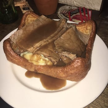 Golden Fleece - Giant and I mean giant Yorkshire pudding with roast beef and so much mash! Gravy of course. - Pubs Near Me - York, NYK Golden Fleece - Giant and I mean giant Yorkshire pudding with roast beef and so much mash! Gravy of course. - Pubs Near Me - York, NYK