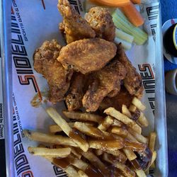 Sidelines Sports Bar - Wings w/Buffalo sauce, Fries/Gravy, topped off with a happy hour OV.
