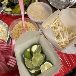 bean sprouts, lime wedges, and ground peanuts bean sprouts, lime wedges, and ground peanuts