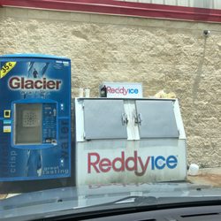 Family Dollar - Trash on top of the ice because no place to throw trash away
