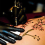 Next Level Tattoo and Fringe Art Collective