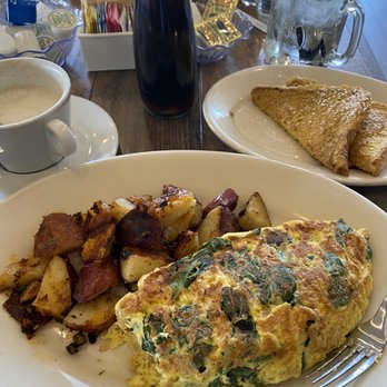 Briki Cafe - Spanakopita omelette with French toast , so delicious! - Greek Near Me - Addison, Illinois Briki Cafe - Spanakopita omelette with French toast , so delicious! - Greek Near Me - Addison, Illinois