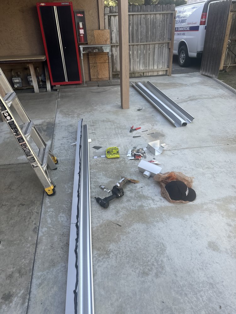 Slide of T’S Roofing