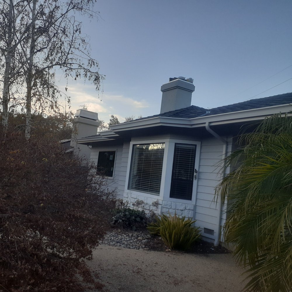 Slide of JB Rain Gutter installation