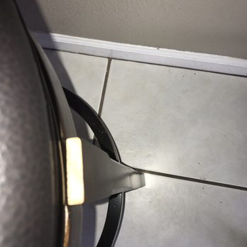 Ashley Store - Bar stool leg put on wrong with the top of the wood by the seat unfinished. - Furniture Stores Near Me - Wesley Chapel, Florida Ashley Store - Bar stool leg put on wrong with the top of the wood by the seat unfinished. - Furniture Stores Near Me - Wesley Chapel, Florida