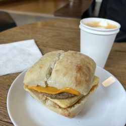 Vegan Breakfast Sandwich with Just Egg, cheddar cheese, chipotle mayo and sausage on ciabatta bread. (Yes, all vegan.)