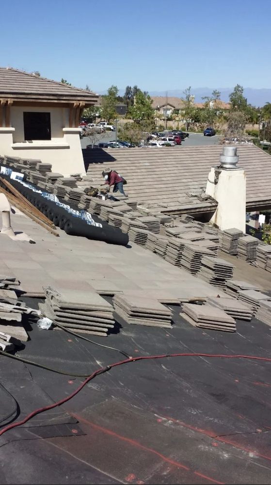 Slide of Romero's Roofing