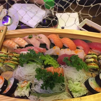 Volcano - Variety of sashimi sushi in the love boat - Chinese Near Me - Odessa, Texas Volcano - Variety of sashimi sushi in the love boat - Chinese Near Me - Odessa, Texas