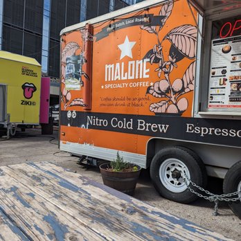 Malone Specialty Coffee - a coffee truck parked in a parking lot - Coffee & Tea Near Me - Austin, Texas