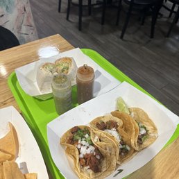 El Pastor and Carne Asada tacos, vegetarian burrito (medium) El Pastor and Carne Asada tacos, vegetarian burrito (medium)