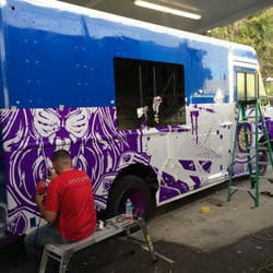 Design Print Plus - Orlando City Soccer team bus being wrapped by DesignPrintPlus