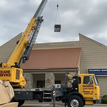 Protech Heating & AC of Abilene - Lowering to set unit in place - Coldwell Banker building - Heating & Air Conditioning/HVAC Near Me - Abilene, Texas Protech Heating & AC of Abilene - Lowering to set unit in place - Coldwell Banker building - Heating & Air Conditioning/HVAC Near Me - Abilene, Texas