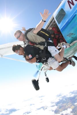 Summer Tandem Skydiving - Experience the exhilaration of free fall on a tandem skydive. Jumps are available from 14,000' and 20,000'. Must be 18 years old and weaight under 250 pounds - extra charge for customers over 200 pounds. Morning shuttle service from Waikiki. Summer Tandem Skydiving - Experience the exhilaration of free fall on a tandem skydive. Jumps are available from 14,000' and 20,000'. Must be 18 years old and weaight under 250 pounds - extra charge for customers over 200 pounds. Morning shuttle service from Waikiki.