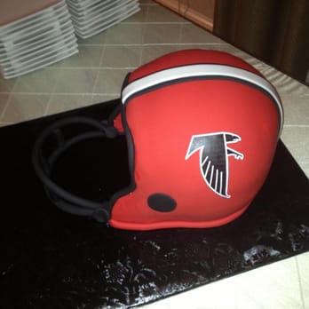 Confection Perfection - A falcons helmet cake with no gold stripe and the logo facing the wrong direction. - Custom Cakes Near Me - Marietta, Georgia Confection Perfection - A falcons helmet cake with no gold stripe and the logo facing the wrong direction. - Custom Cakes Near Me - Marietta, Georgia