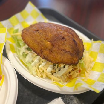 Coco’s Bistro - Number 15: With Madura, gouda and shredded chicken. Absolutely incredible! - Latin American Near Me - Sarasota, Florida