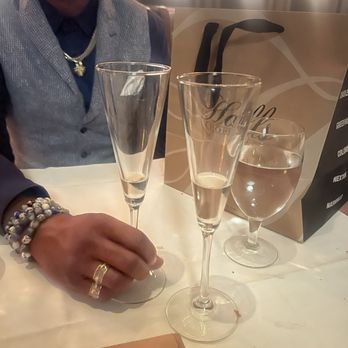 Halls Chophouse - Celebratory champagne glasses - Steakhouses Near Me - Charleston, South Carolina