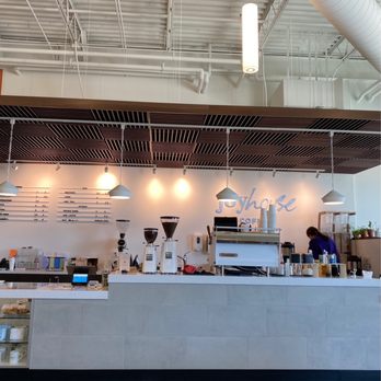 Joyhouse Coffee - a coffee shop counter with a coffee grinder - Coffee & Tea Near Me - BISMARCK, North Dakota Joyhouse Coffee - a coffee shop counter with a coffee grinder - Coffee & Tea Near Me - BISMARCK, North Dakota