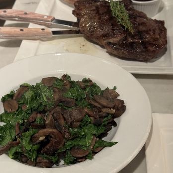 Wolf & Lamb Steakhouse - Kale and Sauteed Kale & Mushrooms Black Angus Cowboy Rib Steak - Steakhouses Near Me - New York, New York Wolf & Lamb Steakhouse - Kale and Sauteed Kale & Mushrooms Black Angus Cowboy Rib Steak - Steakhouses Near Me - New York, New York