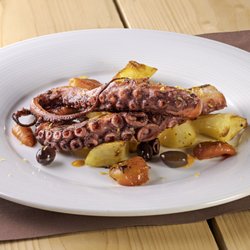 183 - Roasted octopus with potatoes and cherry tomatoes and olives