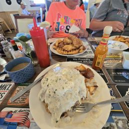 Fried Steak Benny!! Chicken and Waffles. They were both delicious. Cool atmosphere and staff!