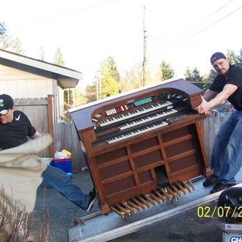 Eastside Movers - Marc is testing Lyle's strength and ability to hold heavy items while in a slant! - Movers Near Me - Everett, Washington