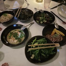(clockwise from top left) fried rice, green beans, shaken beef, duck breast, chinese broccoli, and halibut (clockwise from top left) fried rice, green beans, shaken beef, duck breast, chinese broccoli, and halibut