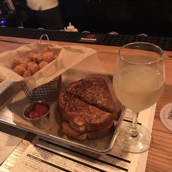 Arsenal Taproom + Kitchen - Master chef grilled cheese with side of tator tots, and a cider - American Near Me - Augusta, Georgia Arsenal Taproom + Kitchen - Master chef grilled cheese with side of tator tots, and a cider - American Near Me - Augusta, Georgia